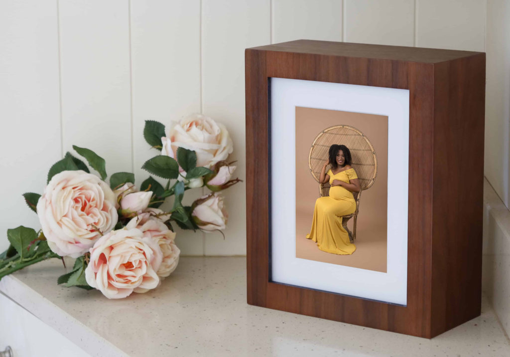 Beautiful maternity portrait inside a wooden folio box
